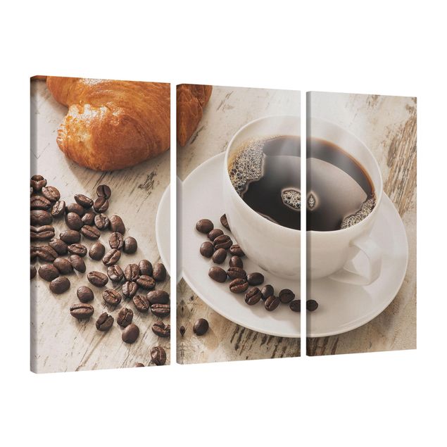 Leinwandbilder Dampfende Kaffeetasse mit Kaffeebohnen