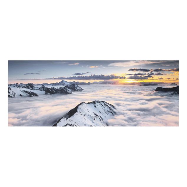Glasbild - Blick über Wolken und Berge - Panorama Quer