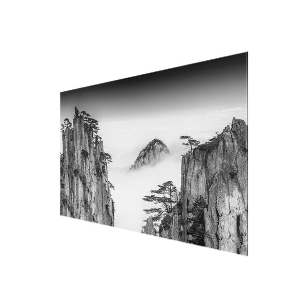 Glasbild - Felsen im Nebel schwarz-weiß - Querformat 2:3