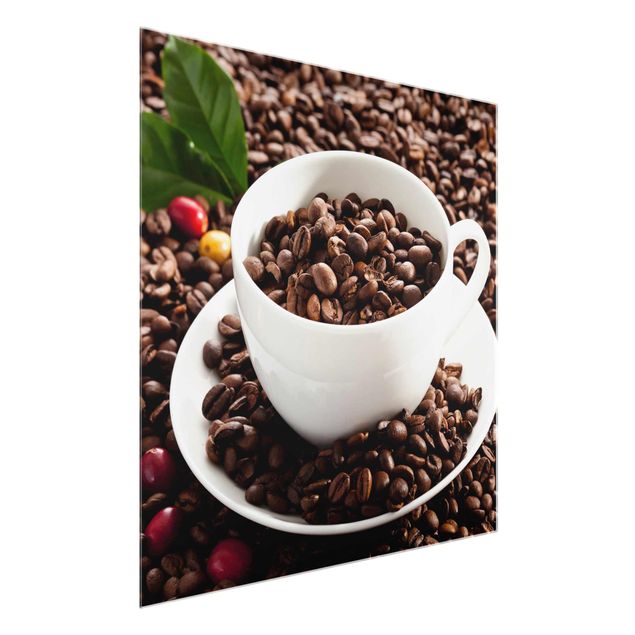 Glasbild - Kaffeetasse mit gerösteten Kaffeebohnen - Quadrat 1:1
