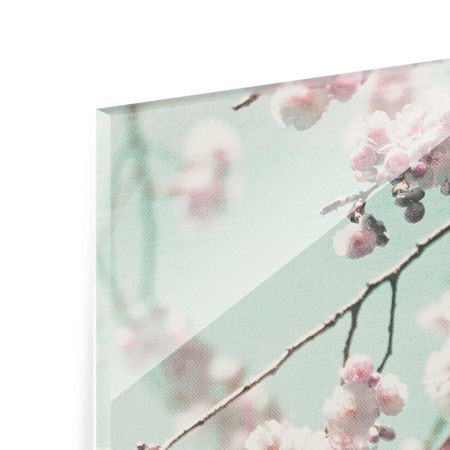 Glasbild - Kirschblütentanz auf Leinenstruktur - Hochformat