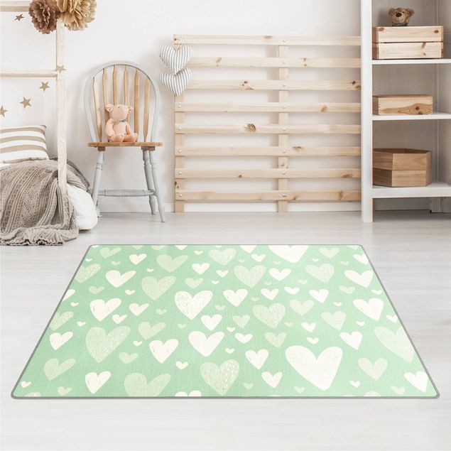 Teppiche groß Kleine und große gezeichnete Weiße Herzen auf Grün