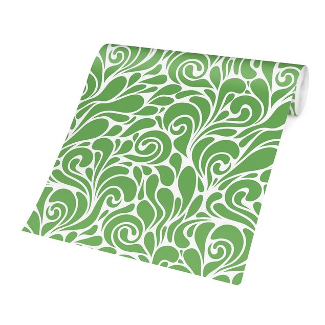 Tapete grün Natürliches Muster mit Kringeln vor Grün