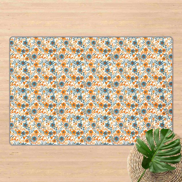 Teppich modern Orange Blaue Blüten auf Weiß