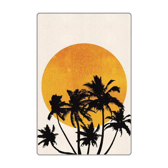 Große Teppiche Palmen vor goldener Sonne
