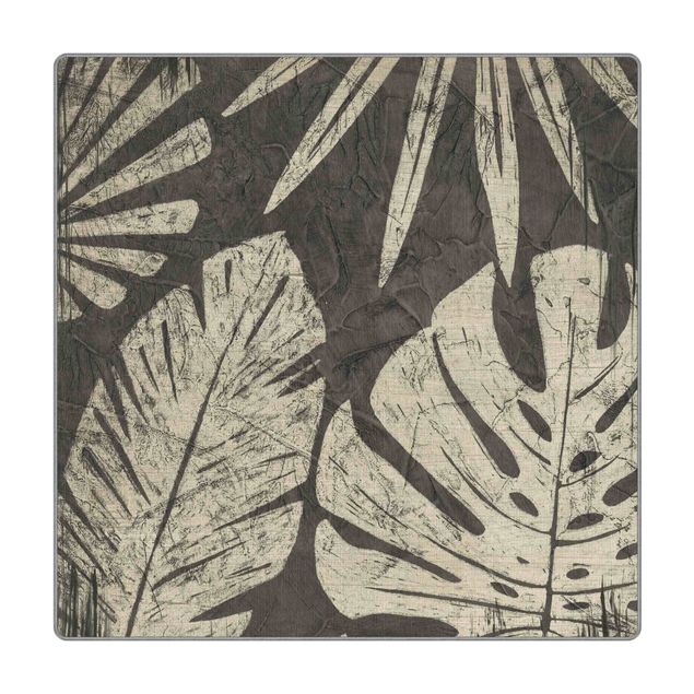 Große Teppiche Palmenblätter vor Dunkelgrau