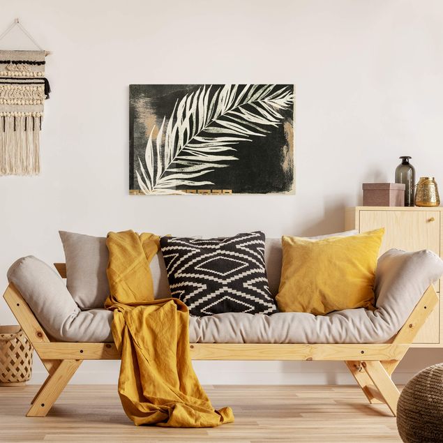 Leinwandbilder Wohnzimmer modern Palmenblatt auf Schwarz und Gold
