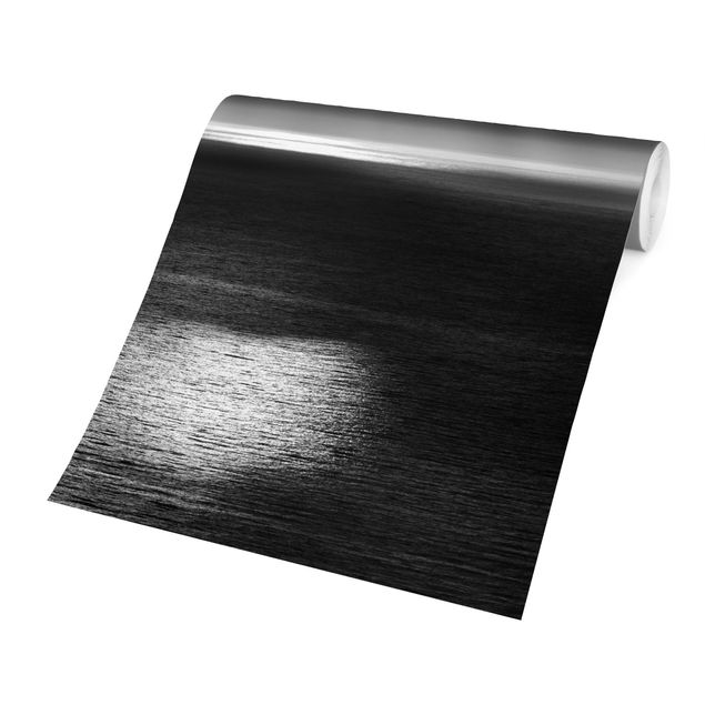 Wandtapete schwarz Sonnenstrahlen über dem Meer Schwarz-Weiß