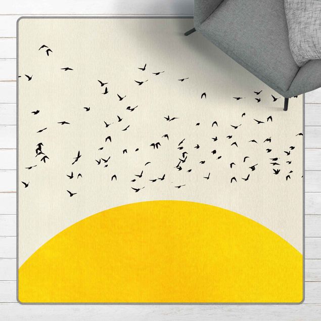 Moderne Teppiche Vogelschwarm vor gelber Sonne