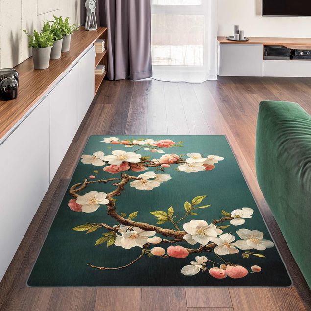 Teppiche Zweig mit Blüten auf Türkis