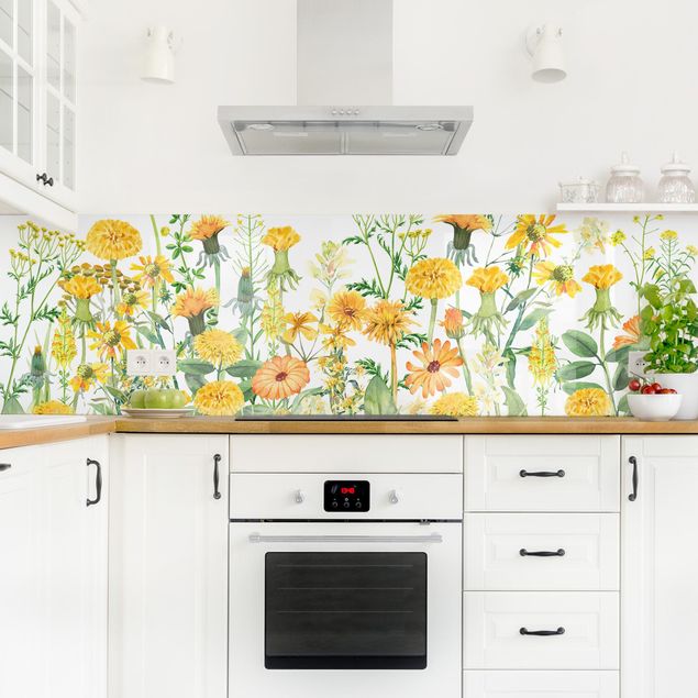 Küchenrückwand Glas Motiv Blumen Aquarellierte Blumenwiese in Gelb
