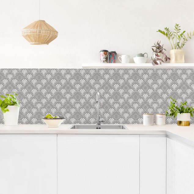 Glasrückwand Küche Muster Glitzeroptik mit Art Deco Muster auf Grau