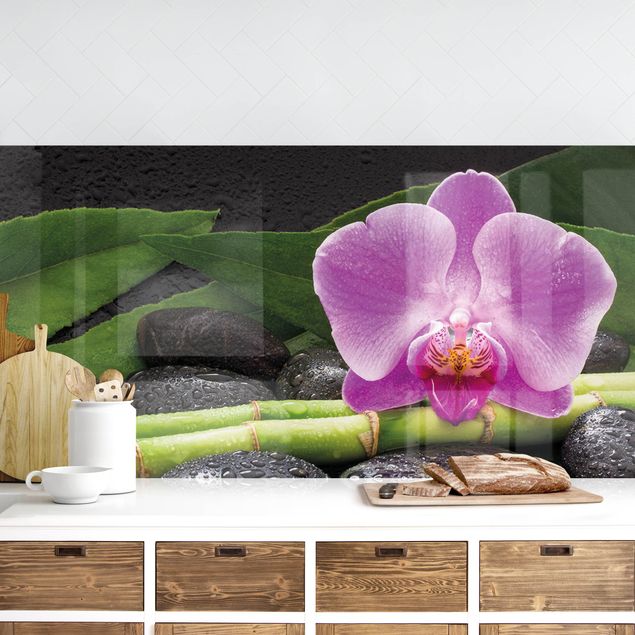 Küchenrückwände Platte Grüner Bambus mit Orchideenblüte