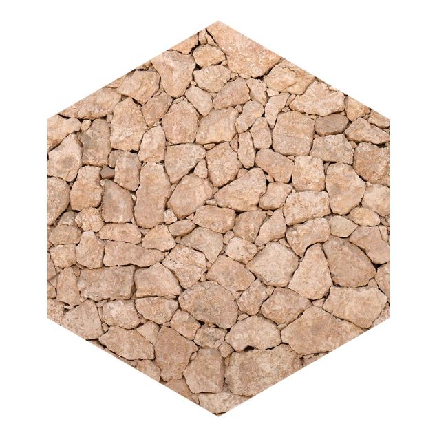 Hexagon Fototapete selbstklebend - Apulia Stone Wall - Alte Steinmauer aus großen Steinen