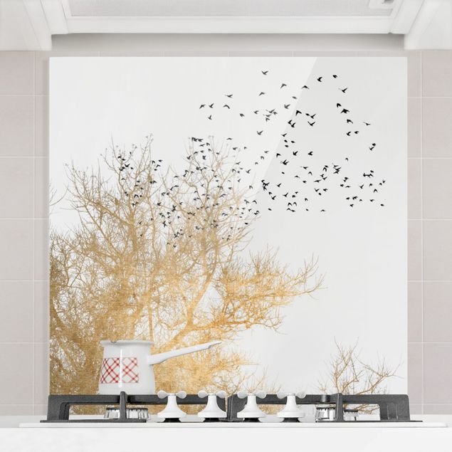 Spritzschutz Glas magnetisch Vogelschwarm vor goldenem Baum