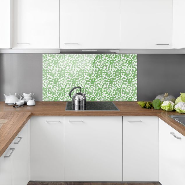 Küchenrückwand Glas Wald Natürliches Muster Pusteblume mit Punkten vor Grün