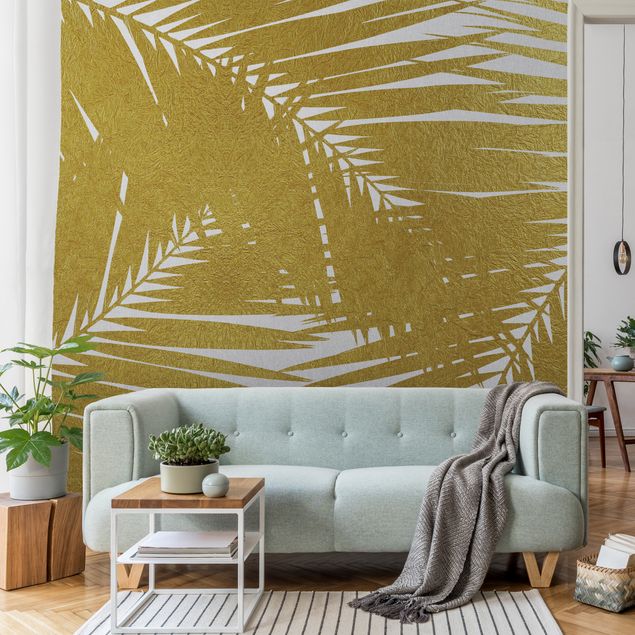 Metallic Tapete  - Blick durch goldene Palmenblätter