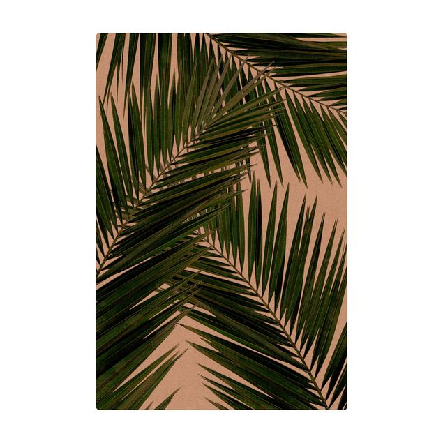 Teppich Esszimmer Blick durch grüne Palmenblätter