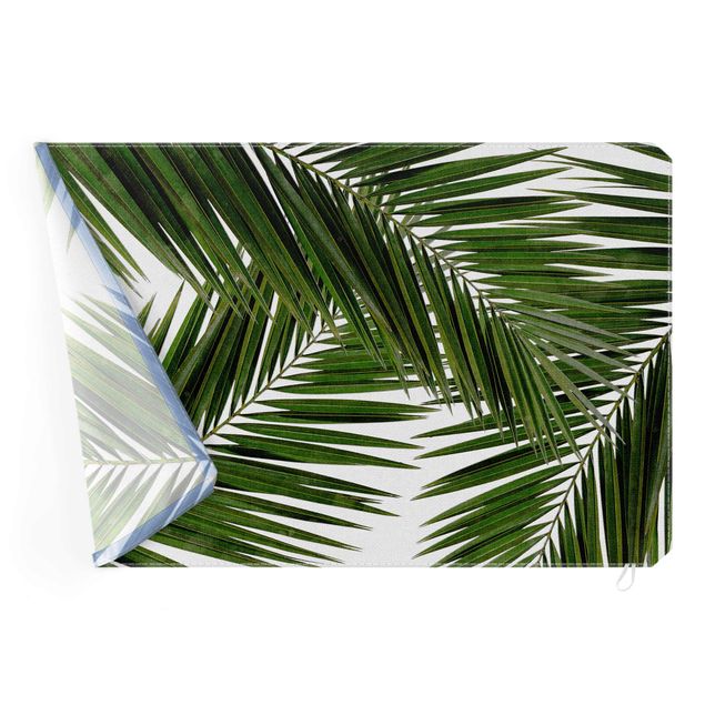 Akustik-Wechselbild - Blick durch grüne Palmenblätter
