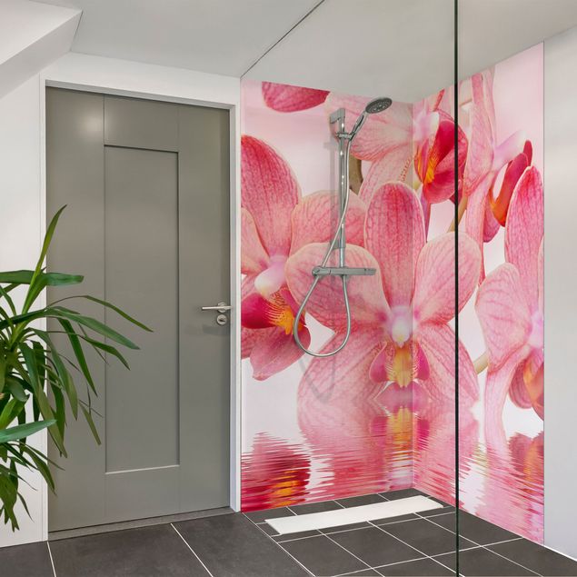 Duschrückwand Motiv Rosa Orchideen auf Wasser