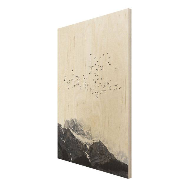 Wandbild Holz Vogelschwarm vor Bergen Schwarz Weiß