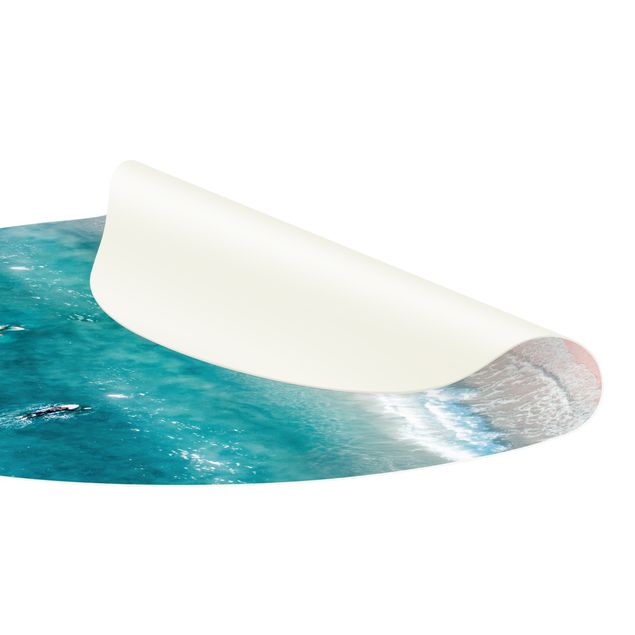 Runder Vinyl-Teppich - Drei Surfer paddeln zum Ufer