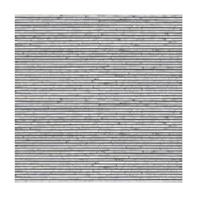 Teppich Steinoptik Holzwand mit schmalen Leisten schwarz weiß
