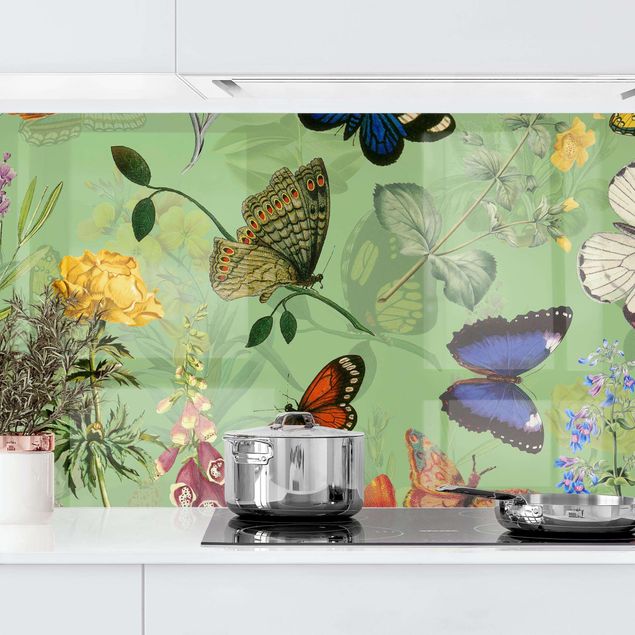 Küchenrückwände Platte Schmetterlinge mit Blumen auf Grün