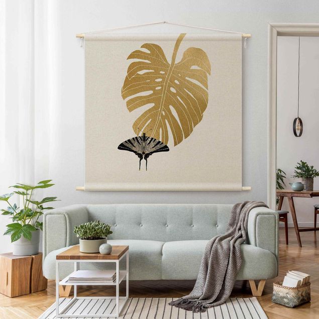 Wandbehang modern Goldene Monstera mit Schmetterling