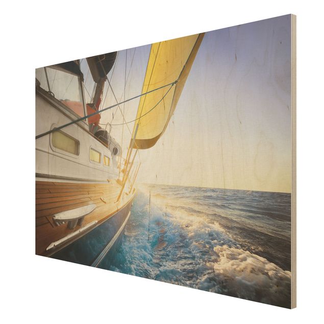 Moderne Holzbilder Segelboot auf blauem Meer bei Sonnenschein