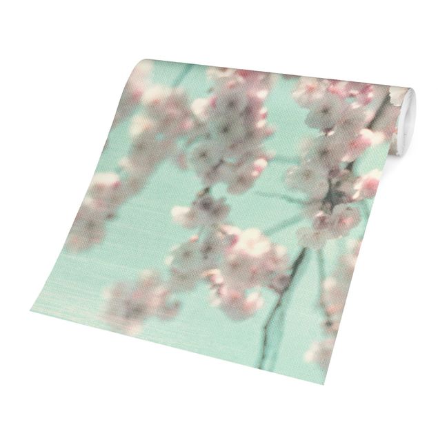 Schöne Fototapete Kirschblütentanz auf Leinenstruktur