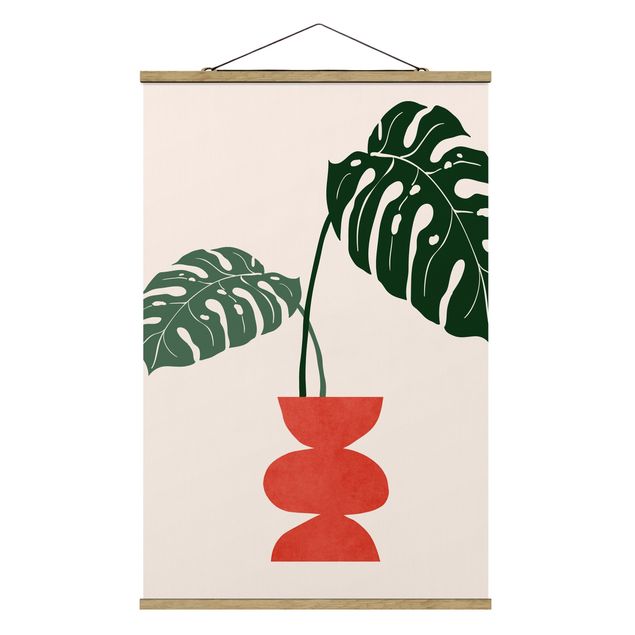 Stoffbild mit Posterleisten - Monstera in roter Vase - Hochformat