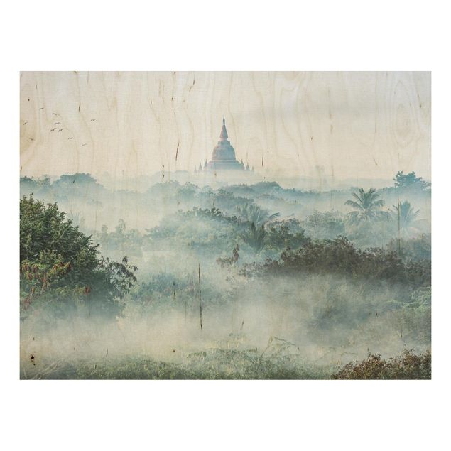 Moderne Holzbilder Morgennebel über dem Dschungel von Bagan