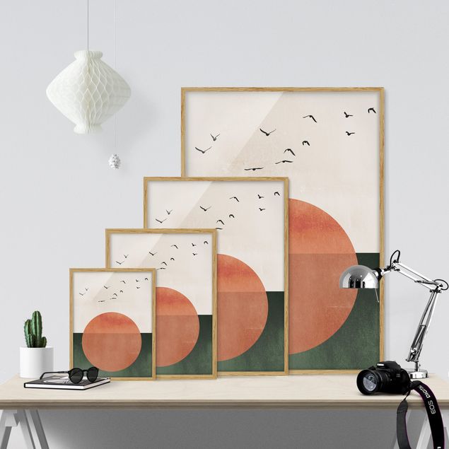 Wandbilder mit Rahmen Vogelschwarm vor aufgehender Sonne