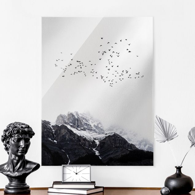 Wandbilder Tiere Vogelschwarm vor Bergen Schwarz Weiß