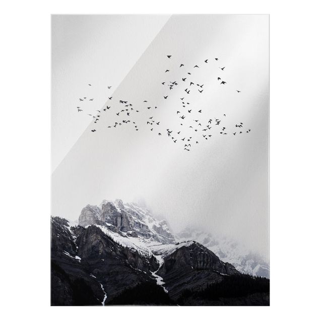 Wandbilder Vogelschwarm vor Bergen Schwarz Weiß