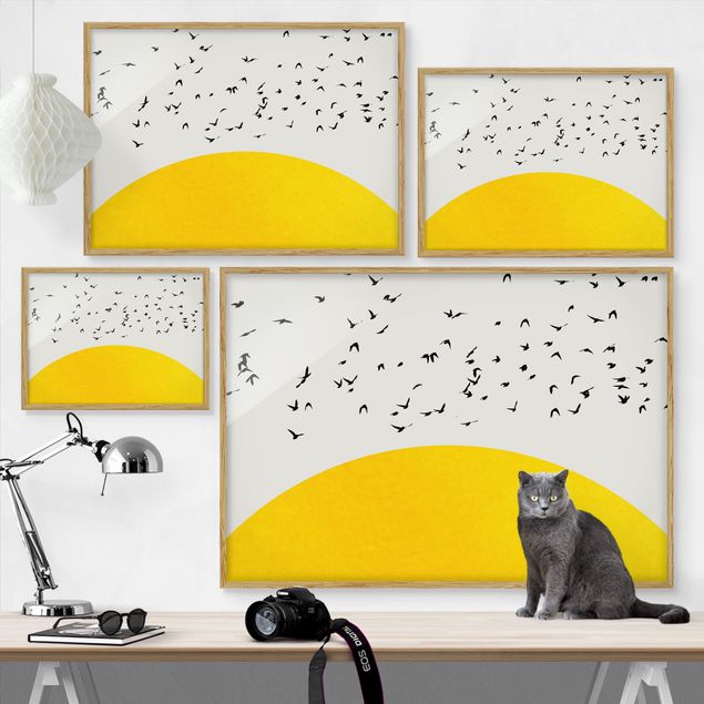 Wandbilder mit Rahmen Vogelschwarm vor gelber Sonne