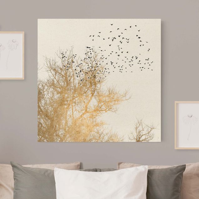 Wandbilder Vögel Vogelschwarm vor goldenem Baum