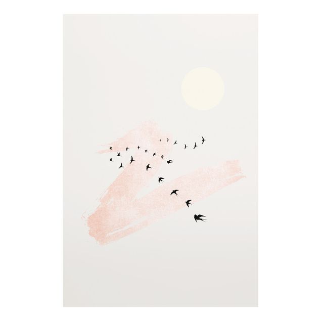 Glasbilder Tiere Vogelschwarm vor Rosa Himmel