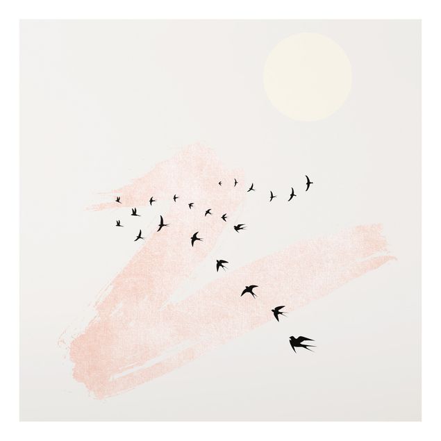Glasbild Tiere Vogelschwarm vor Rosa Himmel