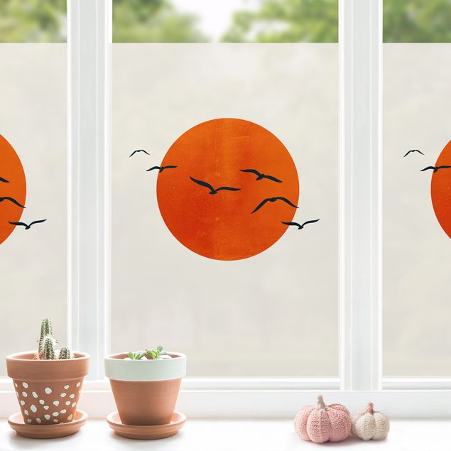Fensterbild Tiere Vogelschwarm vor roter Sonne I