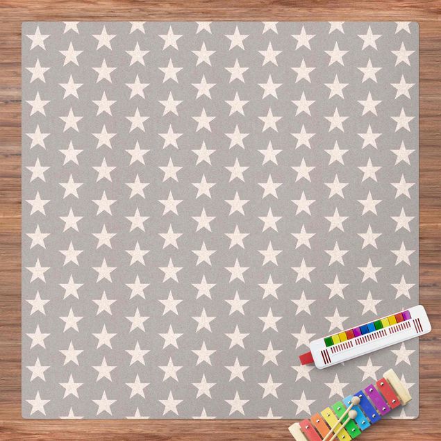 Teppiche Weiße Sterne auf grauem Hintergrund