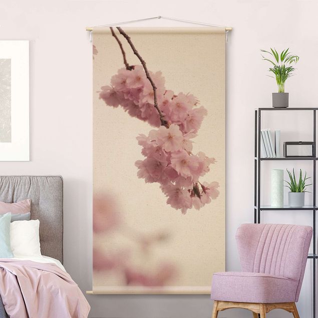 Wandbehang Zartrosane Frühlingsblüte mit Bokeh